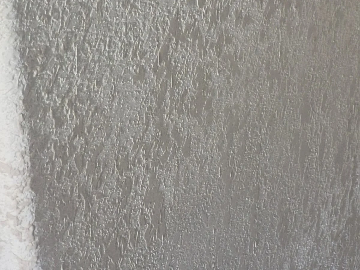 Close-up of a hand-applied wall texture